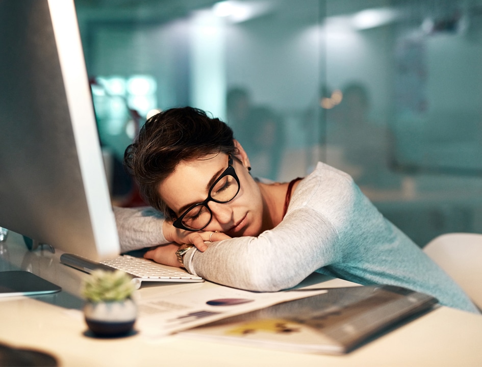 Women sleeping at computer