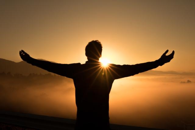 Man looking at sunset