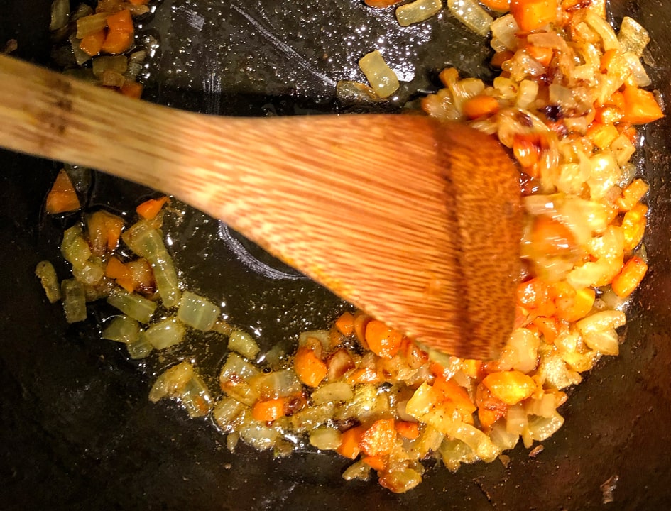 sauteed carrot and onion in pan