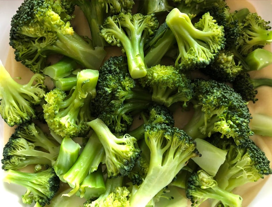 Steamed broccoli over sauce Broccoli Cauliflower Casserole